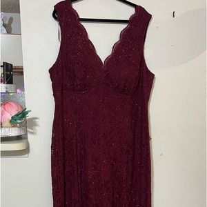 Wedding dress or party. the color is maroon. size W 22 .maxi, stretch,like new.